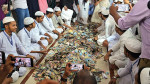 পাগলা মসজিদের দান বাক্সের টাকা গণনা চলছে। সংগৃহীত ছবি